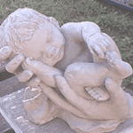 Baby In Hands Statue